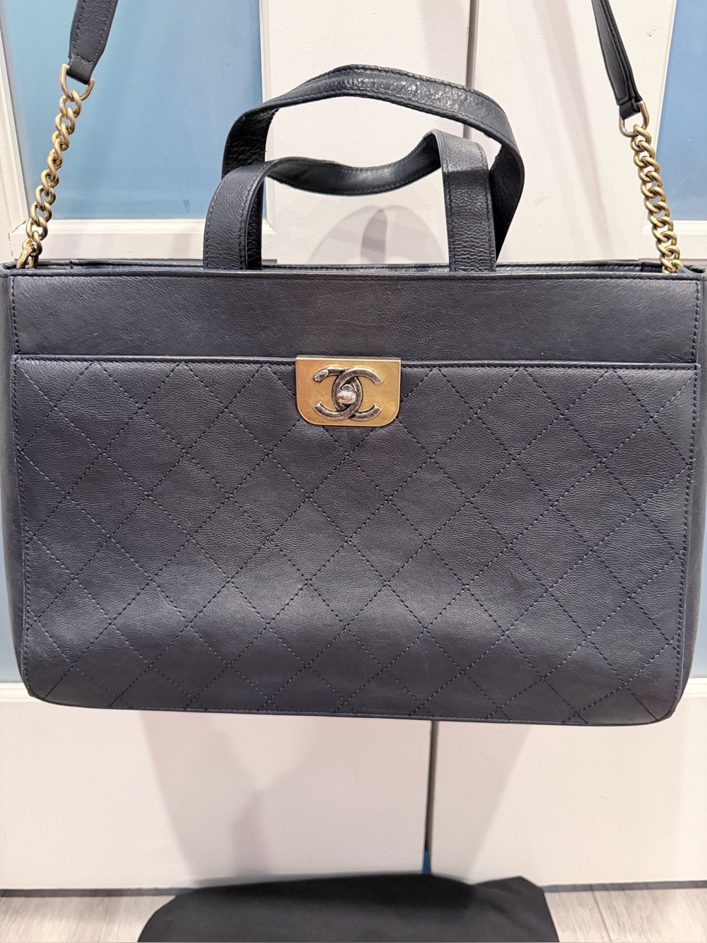 CHANEL Black Quilted Leather Satchel with Gold-Tone CC Hardware